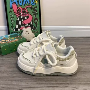 Trendy women's thick-sole platform white sneakers with green accents and rope laces