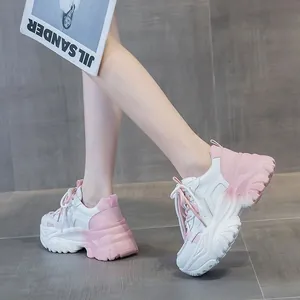 Stylish white and pink chunky sneakers for women with thick platform soles