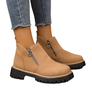Elegant tan suede ankle boots for women featuring a chunky heel and side zipper closure