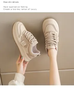 Close-up of cream platform sneakers showing premium leather texture and thick sole