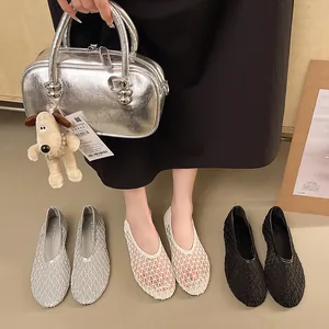 Detail view of breathable mesh ballet flats in silver, white, and black colors.