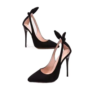 Elegant black pointed-toe high heels featuring decorative bow and slim stiletto.