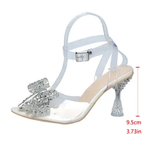 Transparente Sandalette mit Strassschleife und 9,5 cm Absatz