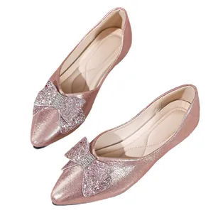 Elegant pink pointed-toe flat shoes with rhinestone bow decoration for women