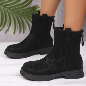 Detail of black leopard print ankle boots with round toe and back zipper for women