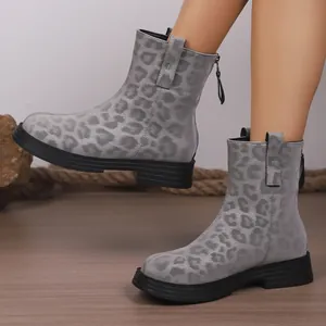 Detailed view of grey leopard print ankle boots with round toe and back zipper