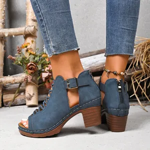 Detailed view of blue peep-toe chunky heel sandals featuring back zipper and buckle strap.