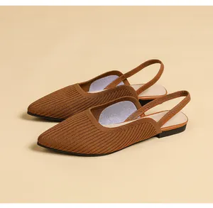 Close-up detail of brown knitted pointed-toe slingback flats with soft breathable soles
