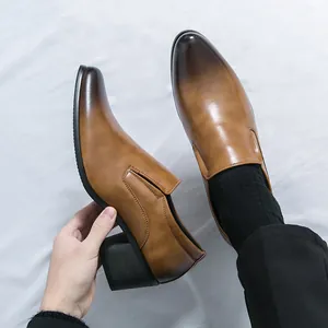Classic men's tan leather dress shoes featuring a block heel and stylish burnished toe