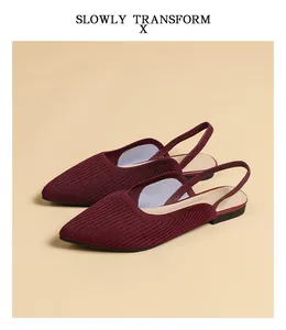 Close-up view of breathable burgundy knitted pointed-toe slingback flat sandals