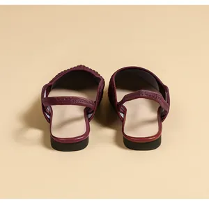 Rear view of burgundy knit slingback flat shoes showing strap detail and soft heel.
