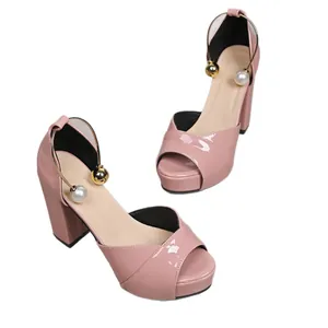 Pink patent leather chunky heel platform sandals with pearl and gold bead accents