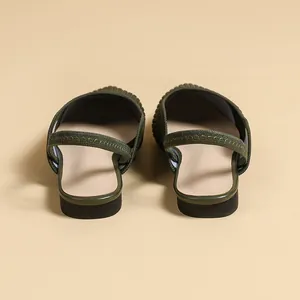 Elegant dark green knitted pointed-toe slingback flats with comfortable back strap