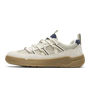 Side profile of beige retro men's GAT sneakers featuring suede panels and mesh