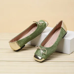 Elegant green velvet ballet flats with gold square toe and bow detail decoration