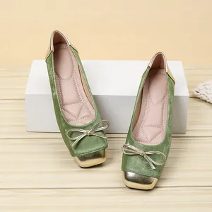 Elegant green velvet square toe ballet flats with gold bow and metallic toe cap detail