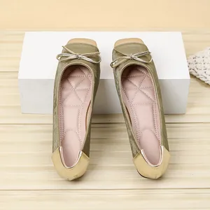 Elegant olive green ballet flats with square toe, metallic gold patchwork, and a bow.