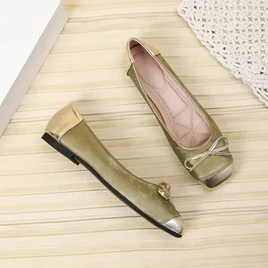 Elegant top-down view of metallic olive green square toe ballet flats with bow detail