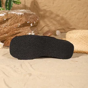Detailed close-up showing the textured black sole of square toe platform beach sandals