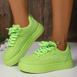 Detailed view of lime green platform bread shoes featuring thick chunky rope laces