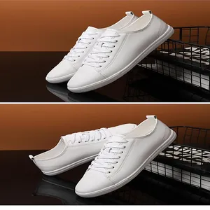 Close-up view of minimalist white leather men's casual sneakers from multiple angles