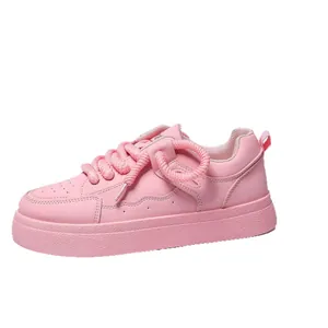 Monochromatic pink chunky bread sneakers for women with thick soles and rope laces.