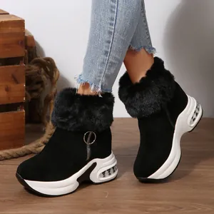 Side view of women's warm snow boots with black faux fur trim and thick white platform