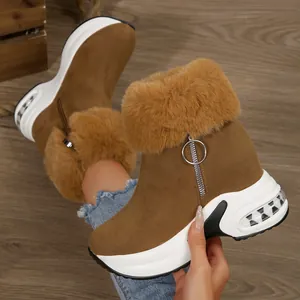 Detail view of stylish brown faux fur platform snow boots for women featuring a side zipper.