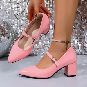 Detail view of pink patent leather Mary Jane dance shoes with elegant block heel