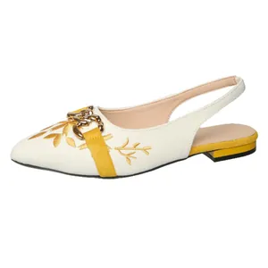 Elegant white embroidered slingback flats with gold chain buckle and pointed toe