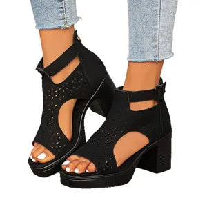 Elegant black block heel sandals with decorative cutout design and peep toe for women