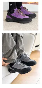 Detail view of purple and grey outdoor hiking shoes with durable non-slip soles
