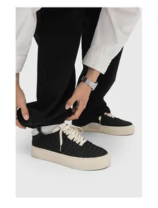 Handmade black woven low-top casual sneakers for men with thick beige rubber soles