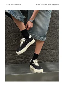 Detailed view of men's premium handcrafted woven low-top casual sneakers in black
