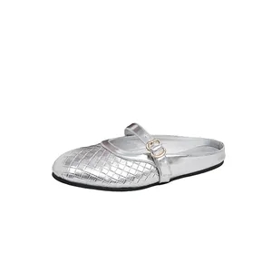Elegant silver round-toe flat mule shoes featuring woven texture and decorative buckle strap