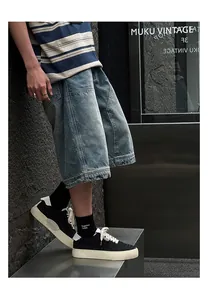 Close-up detail of black hand-woven low-top casual sneakers for men in a street style view