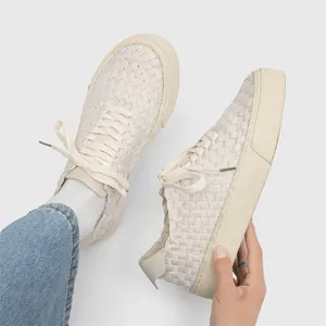 Minimalist handmade woven low-top casual sneakers in cream white with vulcanized rubber sole