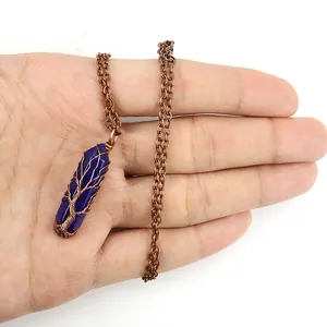 Vintage handmade copper wire wrapped tree of life necklace with lapis lazuli pendant