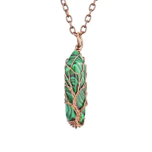 Close-up of handmade wire-wrapped malachite tree of life hexagonal pendant necklace