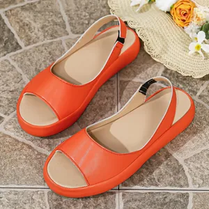 Sandalias de plataforma naranja vibrante con tira trasera para comodidad estival