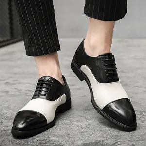 Scarpe Oxford da uomo bicolore bianco e nero con eleganti pantaloni a righe sottili
