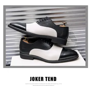 Vista dettagliata delle scarpe bicolore da uomo in stile britannico bianco e nero su base