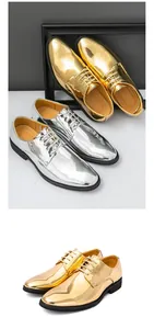 Close-up view of shiny metallic gold and silver men's pointed-toe formal dress shoes