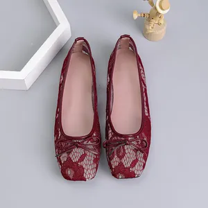 Detailed view of wine red mesh hollow-out ballet flats featuring square toe and cute bow.