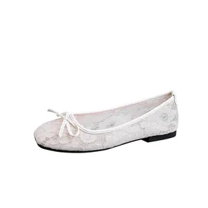 Elegant beige lace mesh ballet flat with square toe and delicate bow detail.