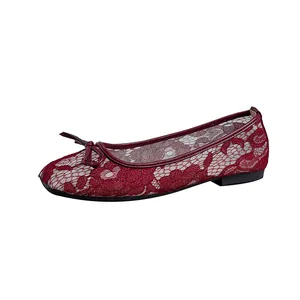 Side detail of burgundy lace mesh ballet flats featuring square toe and delicate bow decoration