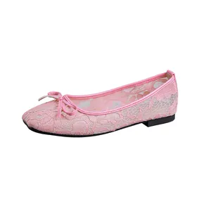 Detailed side view of pink floral mesh lace ballet flats with square toe and bow accent