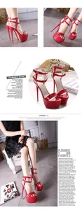 Detailed macro view of red patent leather straps and high stiletto platform heel