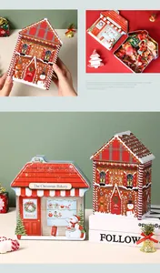 Decorative Christmas house-shaped tin boxes filled with festive candies and holiday treats