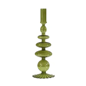 Élégant bougeoir et vase en verre vert avec un design géométrique à billes étagées
